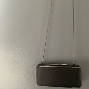 Barney’s black purse